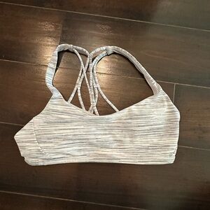 Lululemon white and gray sports bra
Size 4